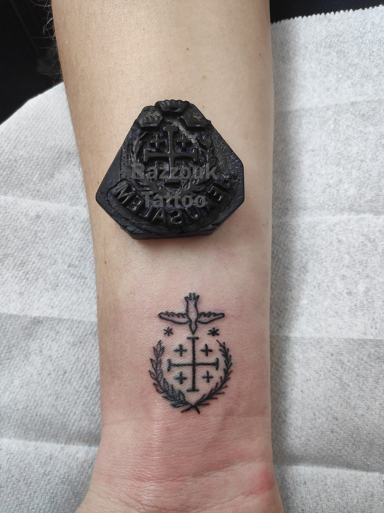 A cross to bare tattoos and tradition in Jerusalem  EgyptToday